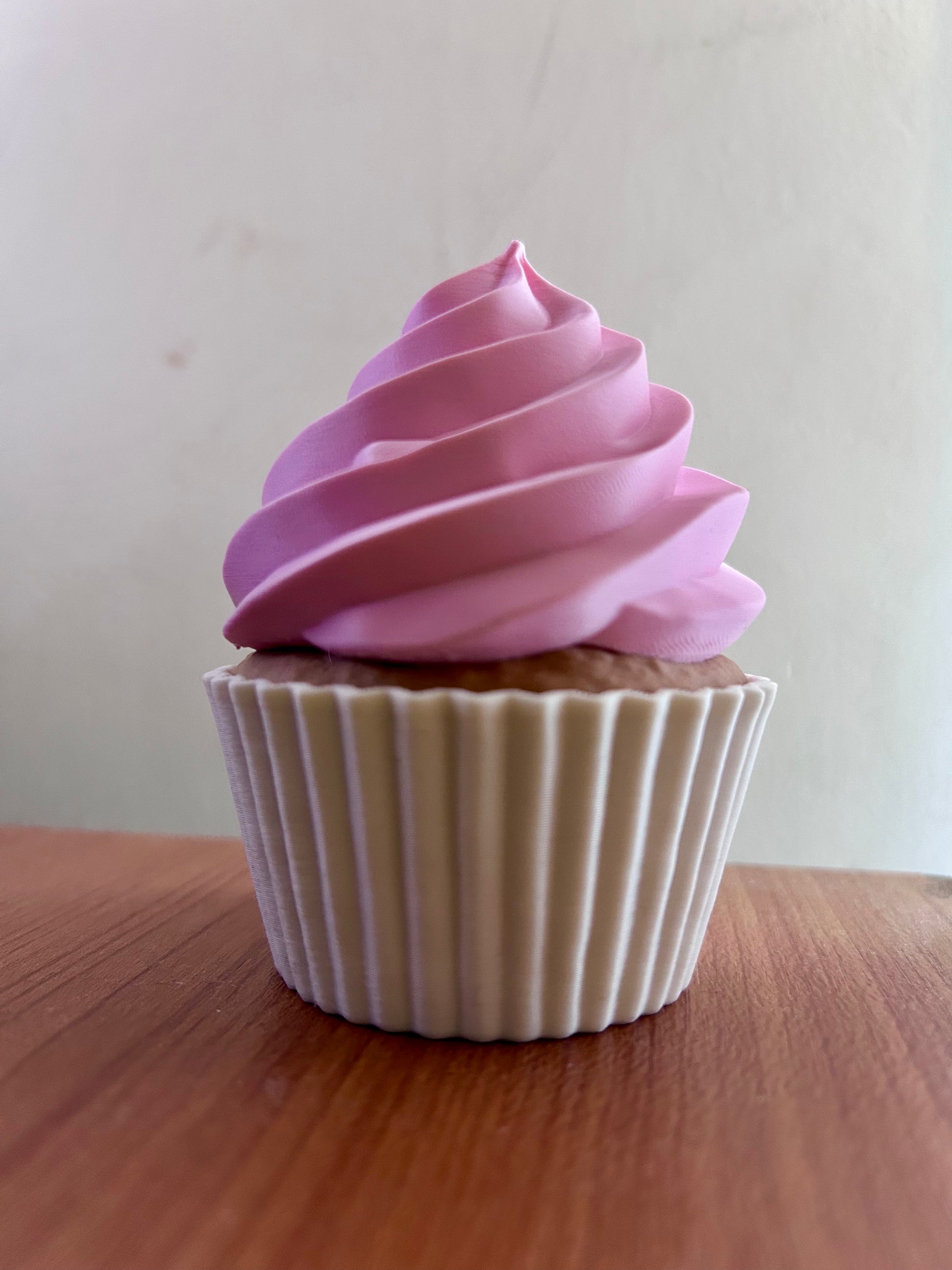 3D printed cupcake cake topper holder with swirled icing and centre hole for an acrylic cake topper